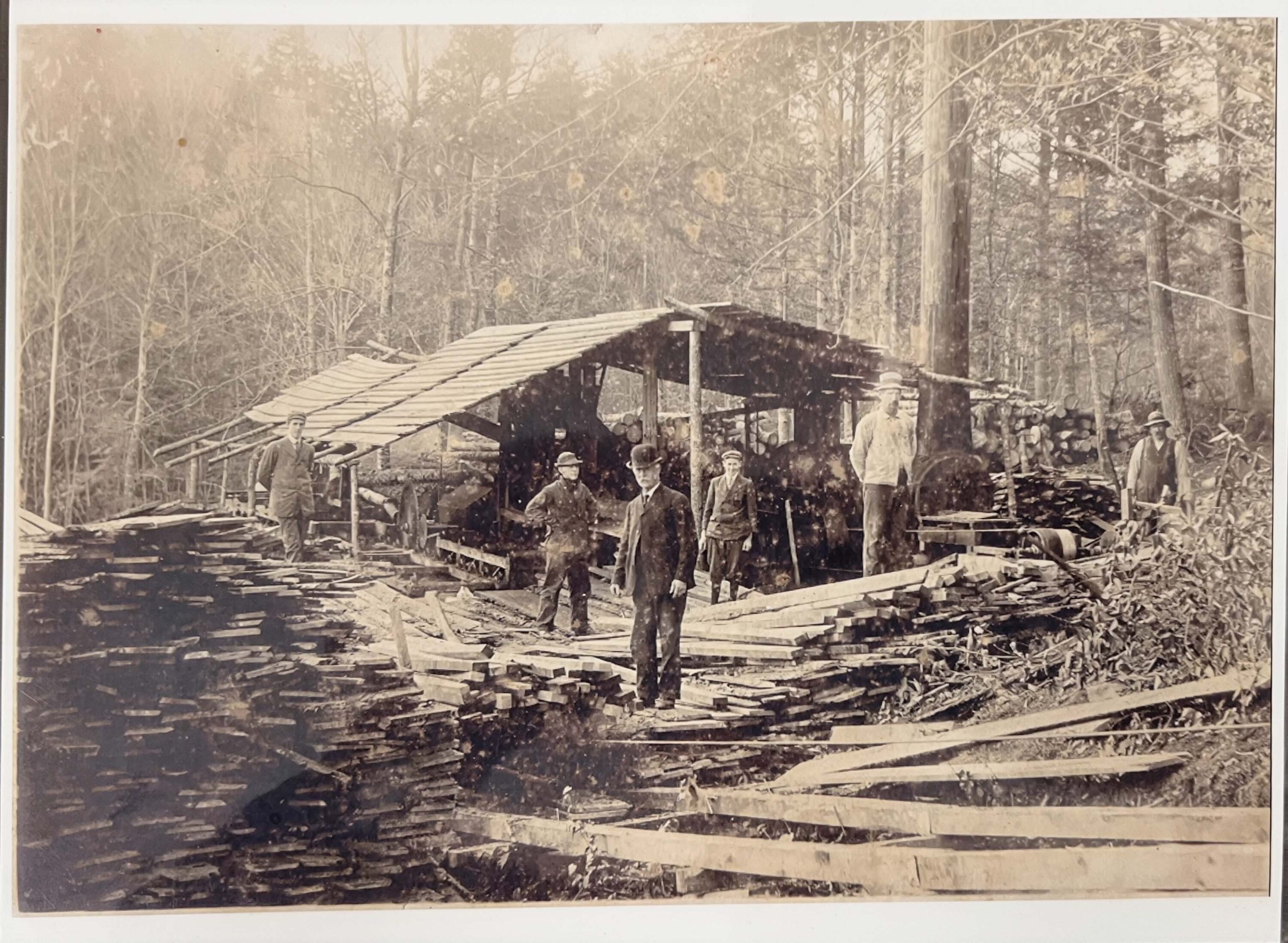 Samuel Paul at his sawmill with sons near Mount Agamenticus.